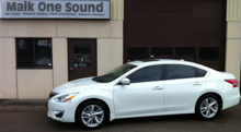 White 2013 Nissan Altima with premium automotive window tint